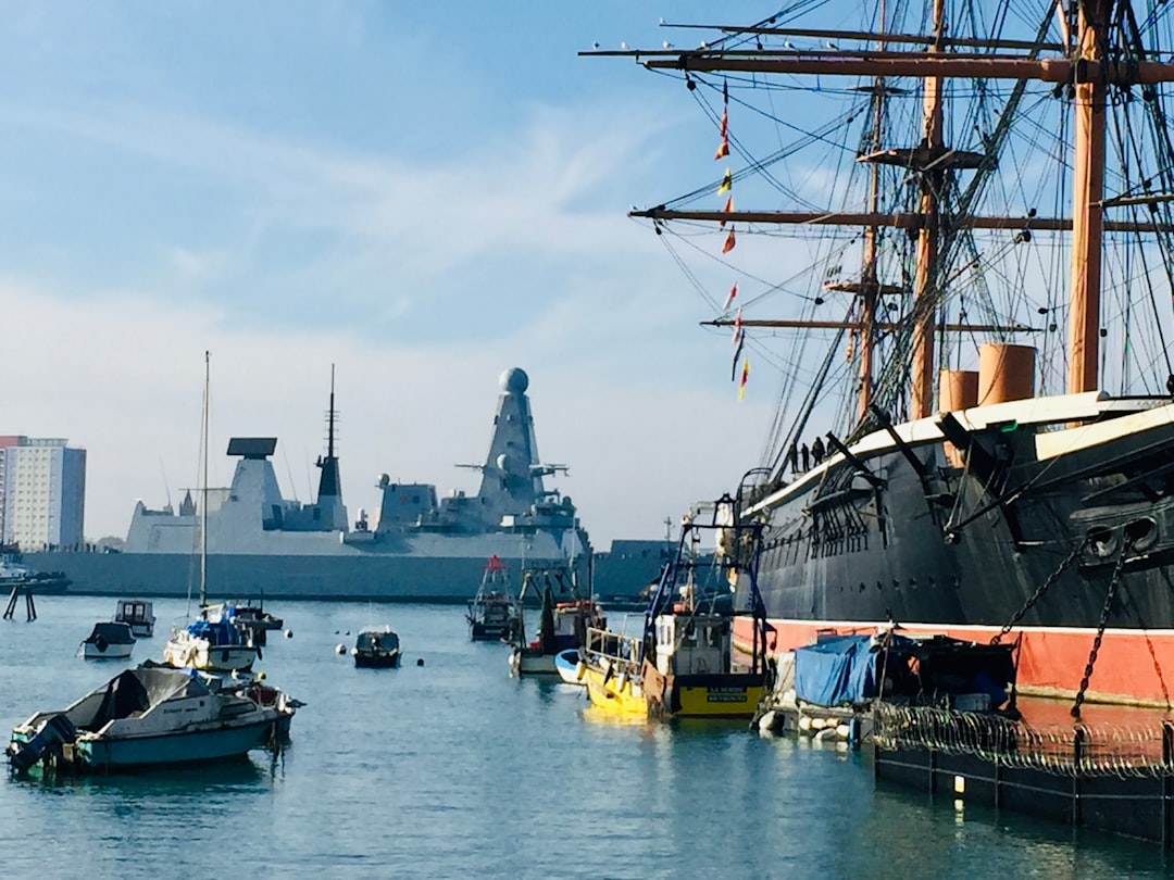 HMS Warrior with modern Uk Navy Ship.